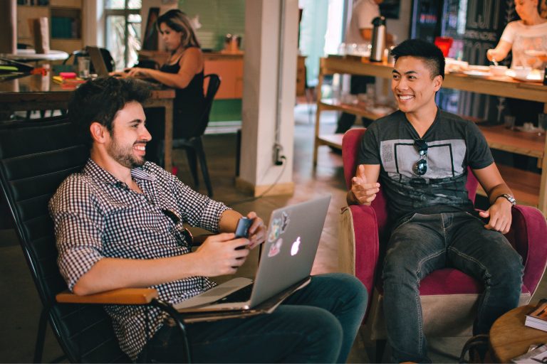 Two guys talking in a coffee shop